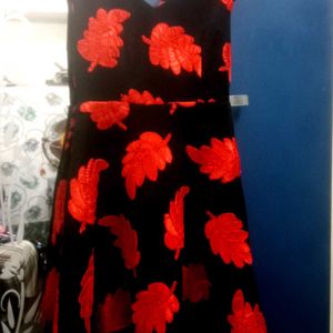 Black V Neck Gown With Red Leaves