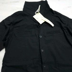 A Black Shirt With Good Or Excellent Quality.