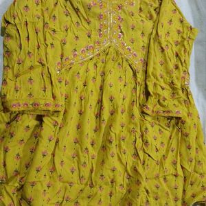 Trendy Yellow  Printed Short Kurti