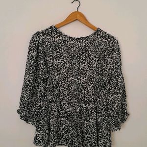 I am selling Lace Neck Printed Top