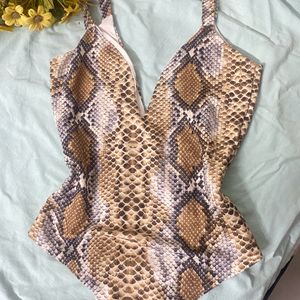 Leapord Print Bodysuit From PRETTYLITTLETHING