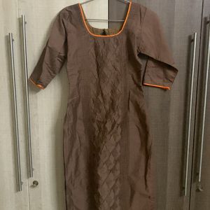 Brown Kurthi With Detailed Work In The Center