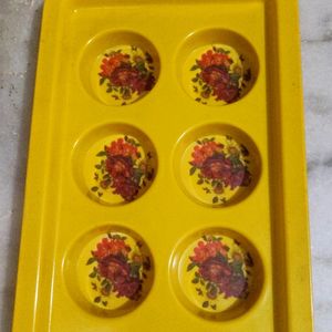 Yellow plastic tray