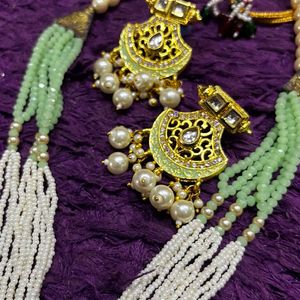 Enduring Charm: Long Pearl Necklace & Earrings Set