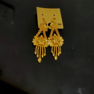 Golden Earrings Hanging