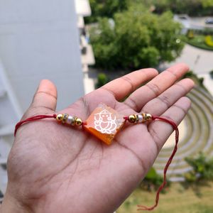 Orange Ganeshji Resin Rakhi