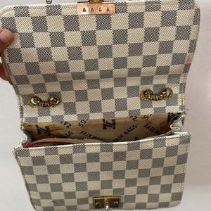 Checkered Beige And Black Sling Bag