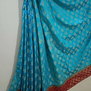 Banarasi SkyBlue Maroon And Gold With Stone Saree