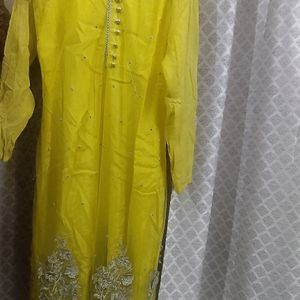 A Very New Yellow Coloured Net Suit With Pajami