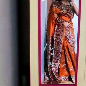 Beautiful Golden coloured floral silk Saree with lace