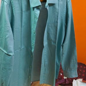 Its A Light Turquoise Colour Shirt From Perri Alley Brand With pakka Condition