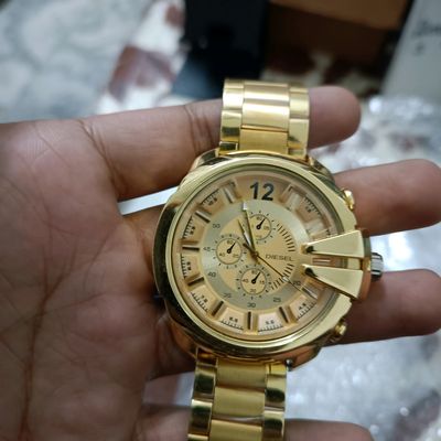 Golden big dial watch hotsell