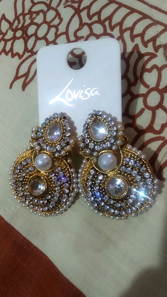 white pearl earrings