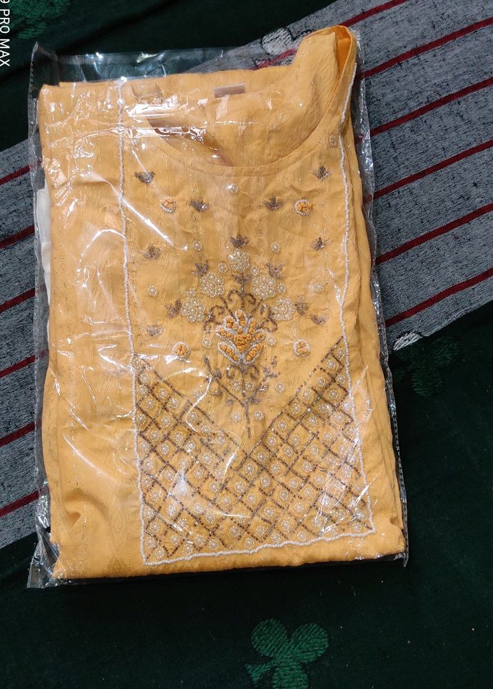 Beautiful Yellow Hand Work Kurta Set.