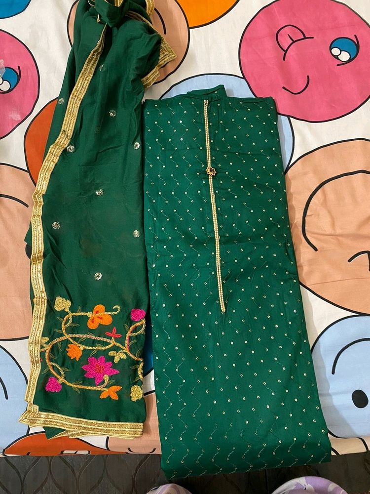 dark green suit with embroidered dupatta
