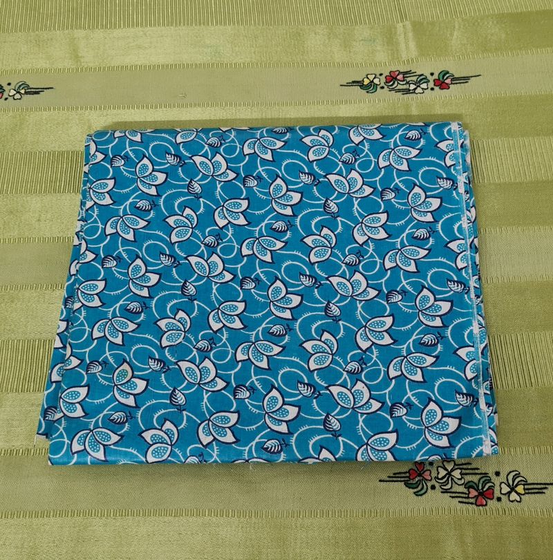 Turquoise blue printed cotton fabric