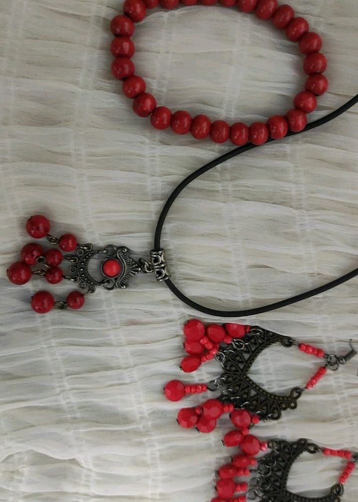 SET OF RED BEADED JEWELLERY