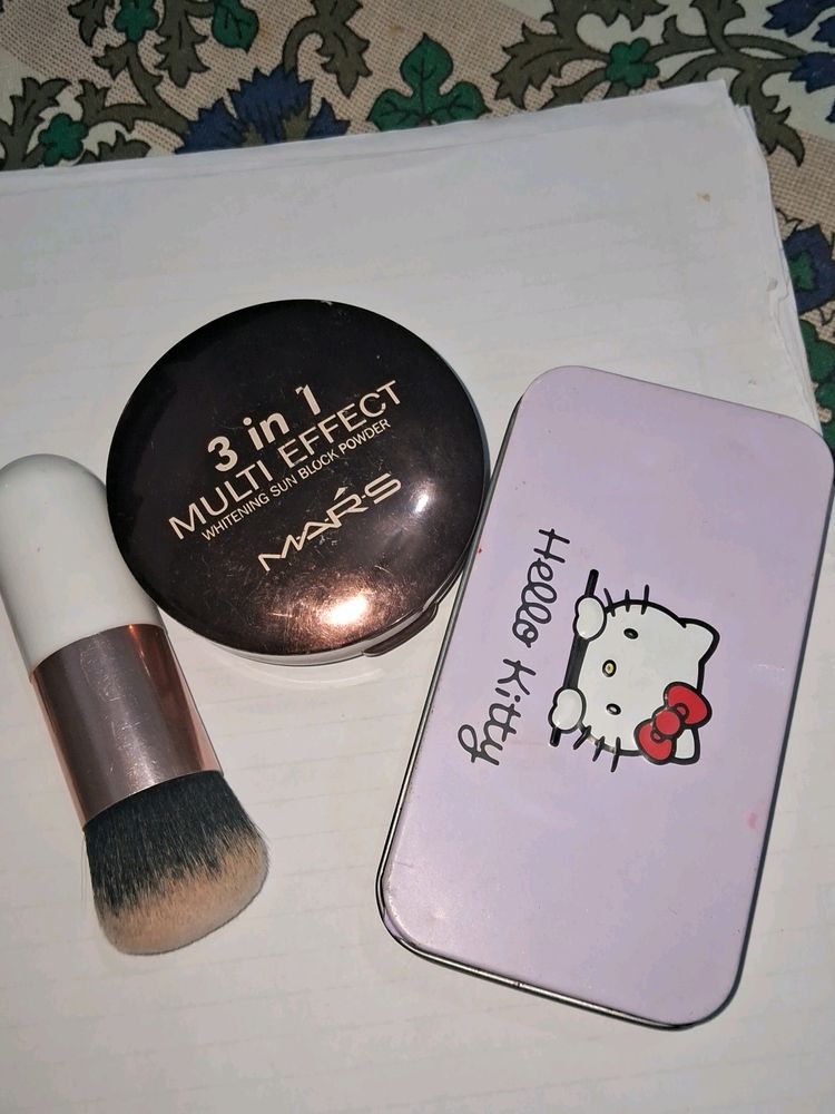 mars compact with makeup and blusher brush