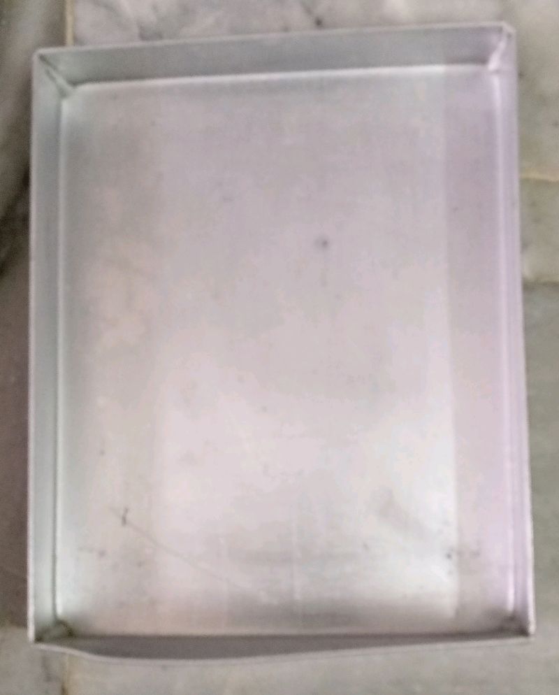 Combo of aluminium tray , chocolate moulds,etc.