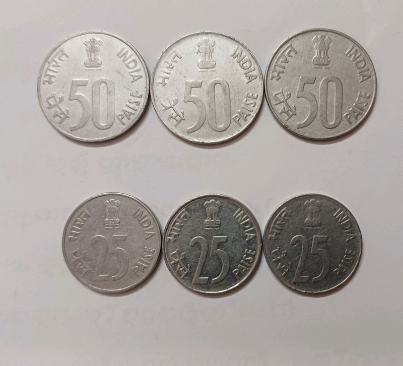 Three 25paise And 50paise Coins