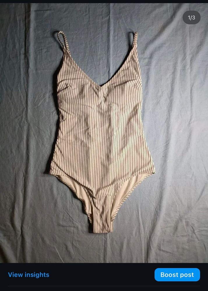 SWIMMING SUIT