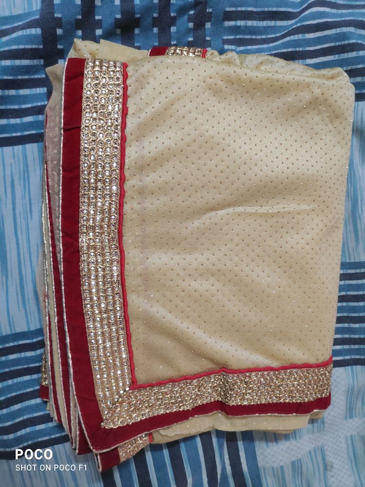 pretty red golden saree.