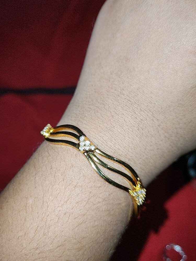 1 Pair Of Golden Bangles