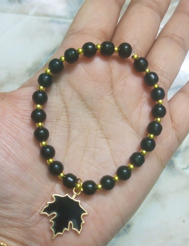 Black Beads Bracelet With Blac Leaf Charm