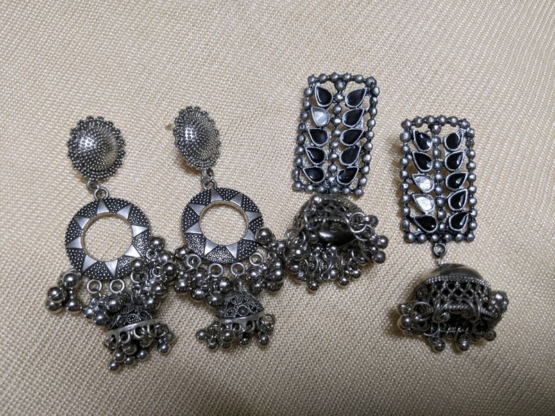 Silver Earrings And Ring