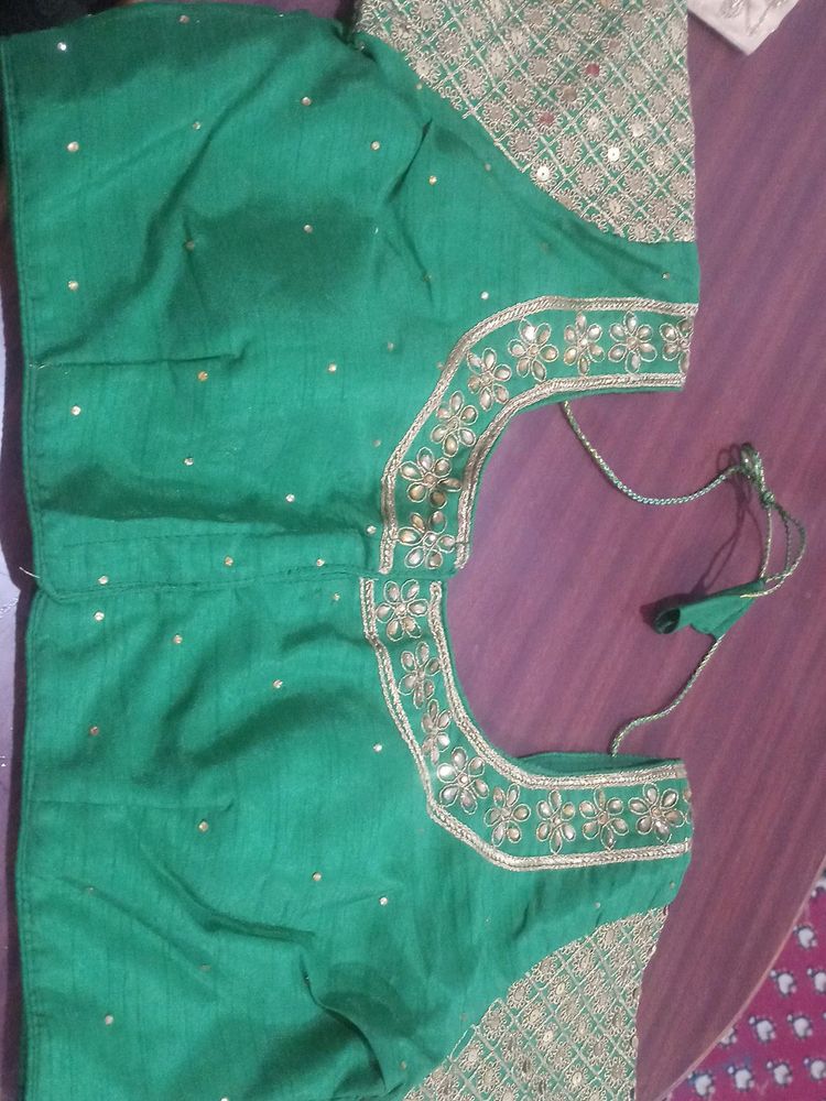 Beautiful  gree. colou raw silk blouse  38 size upto 42 alterable with front open