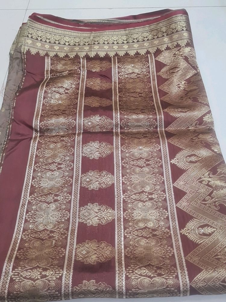 Mauve Color Saree With Golden Print Border