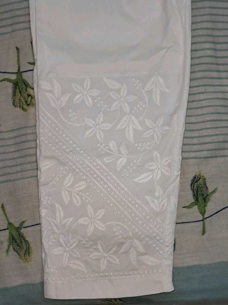 White Straight Pant With Embroidery Work At Bottom