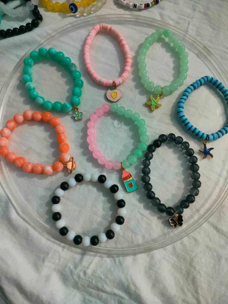 Handmade Bracelets With Glass Beads And Charms