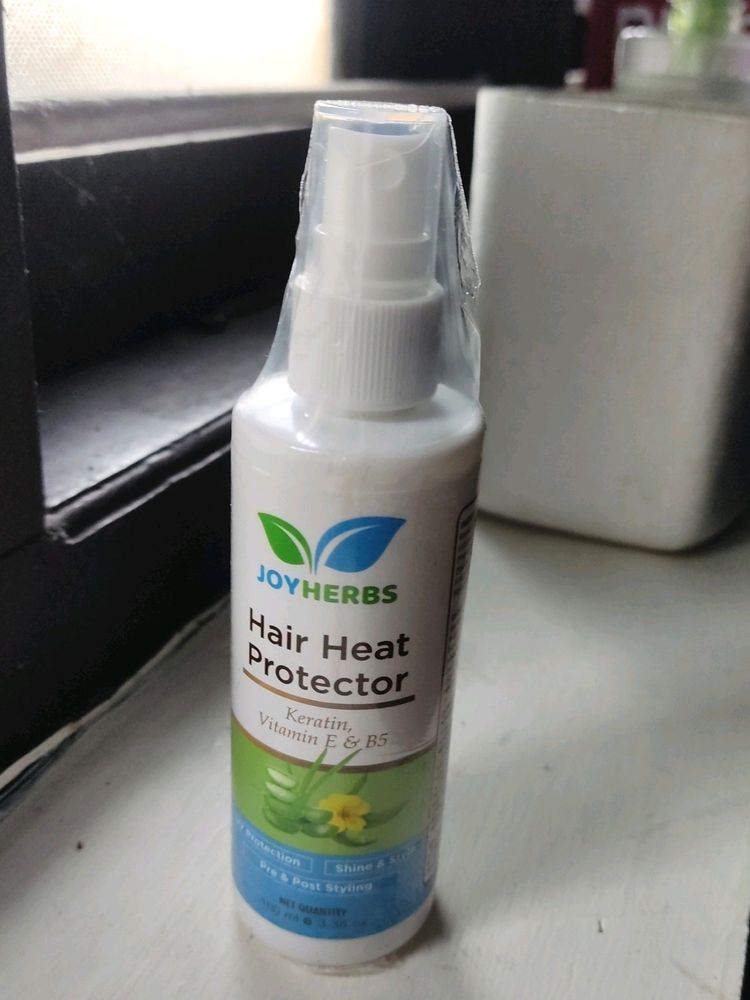 HEAT PROTECTANT SPRAY