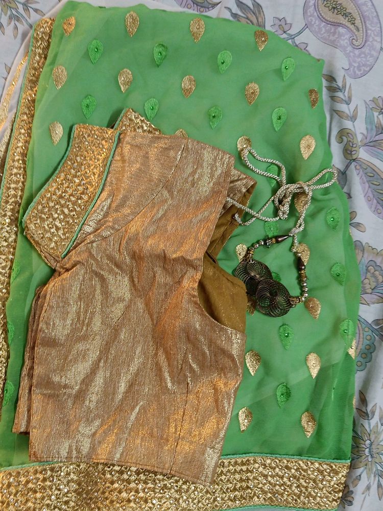 Green, Golden And Cream Saree