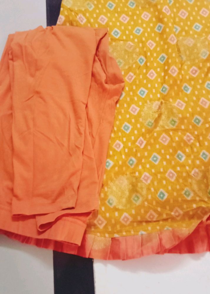 Orange / Ochkar Yellow Kurti And Leggings.