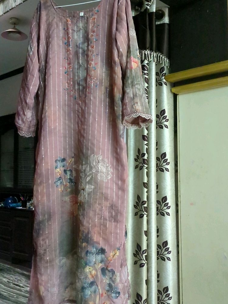 Its A Pakistani Kurti Set With Bottom