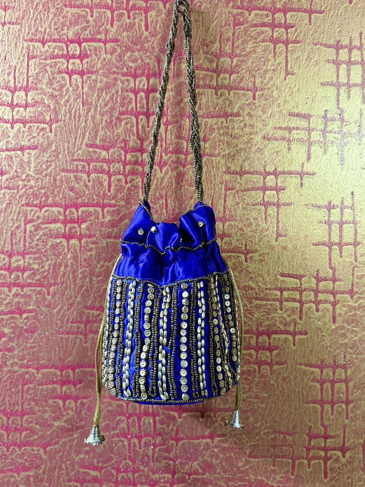 Purple Gold Potli Bag Hand Worked Desion