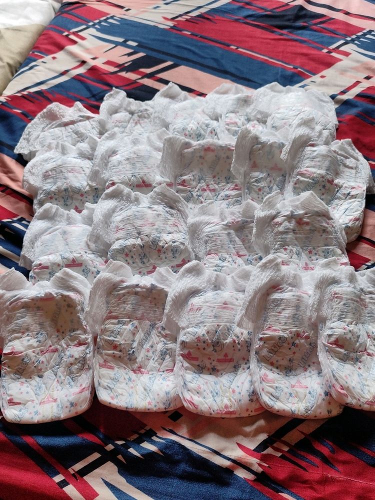 19 Unused Diapers From 24 Diaper Packet.