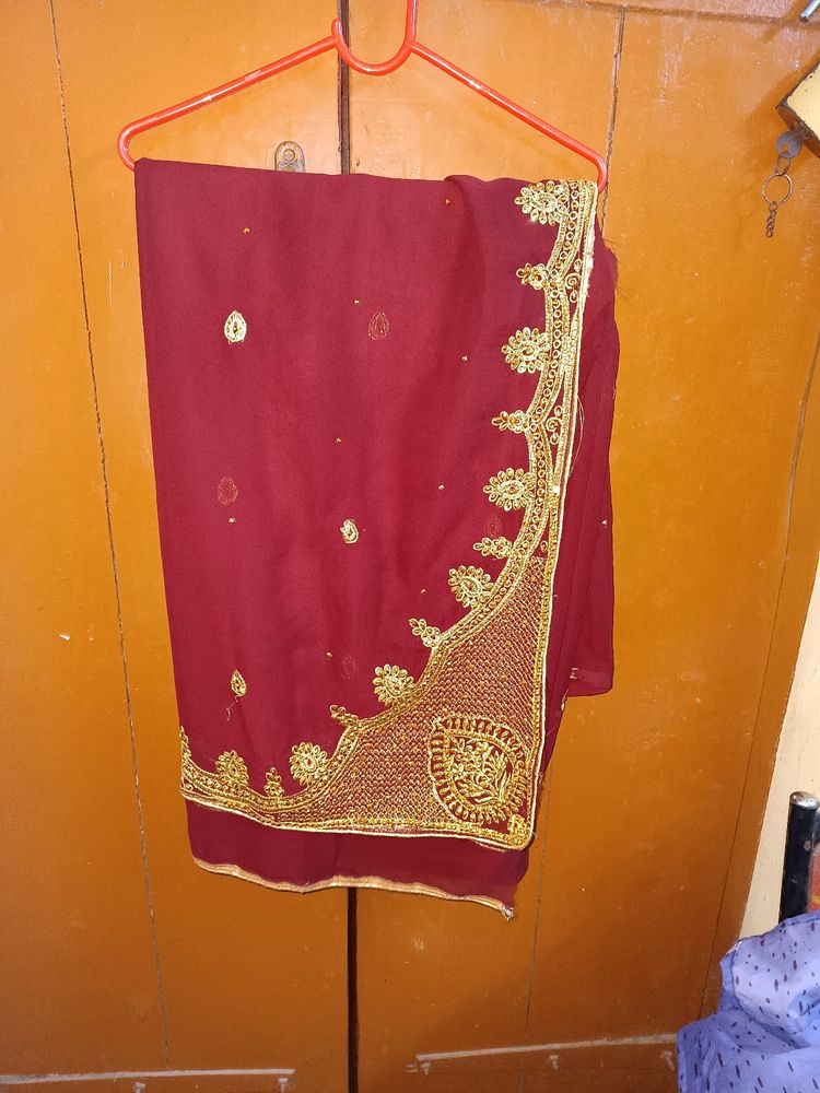 Beautiful maroon heavy bridal saree