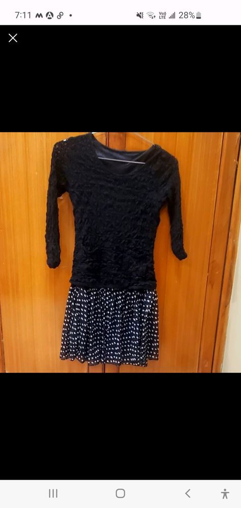 short black dress with full sleeves. imported good material.