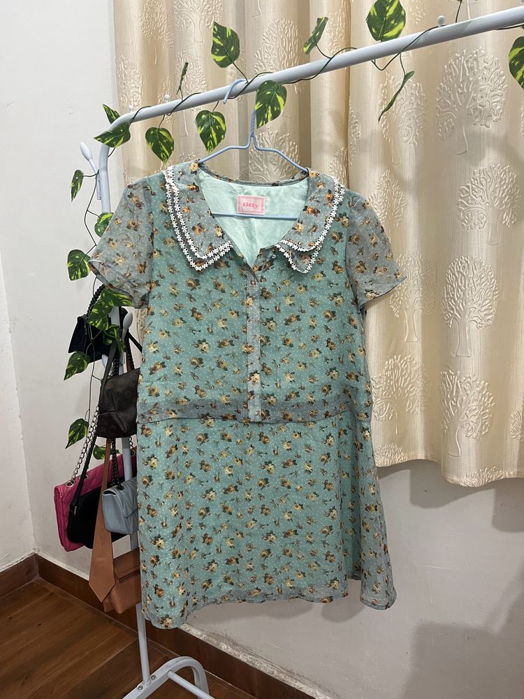 Sea Green Knee-length loose fit dress.