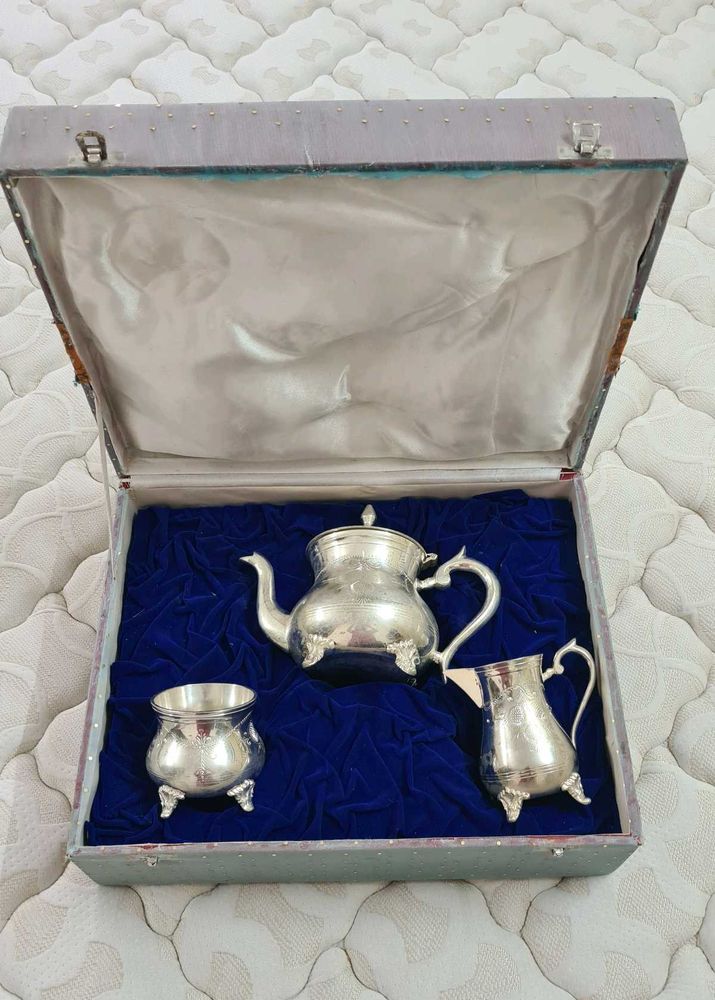 Antique Tea Set with silver polish