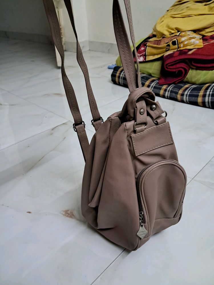 Two Way Beige Purse And Bagpack