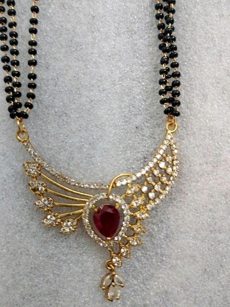 AD Mangalsutra Studded Stones.