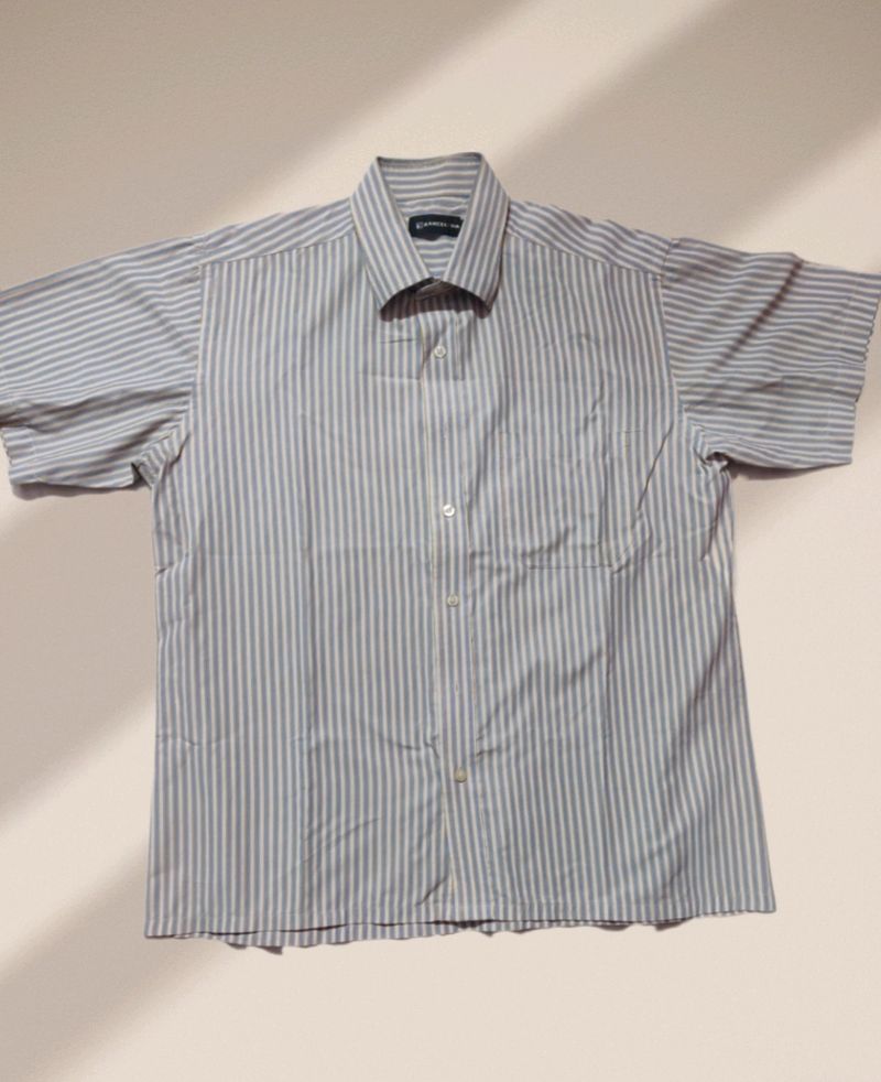 light blue and white formal shirt with a thin stri