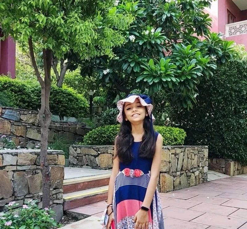 A Multicolour Dress For Girls With Floral Hat