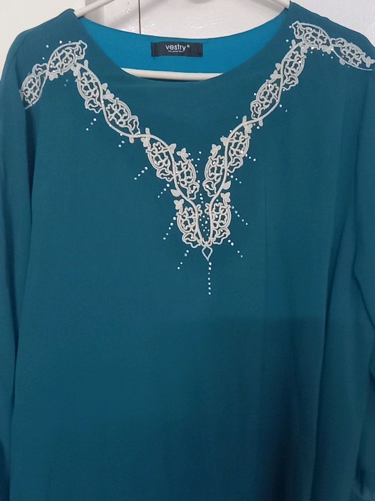 New Teal Tunic, pattern sleeves white embroidery