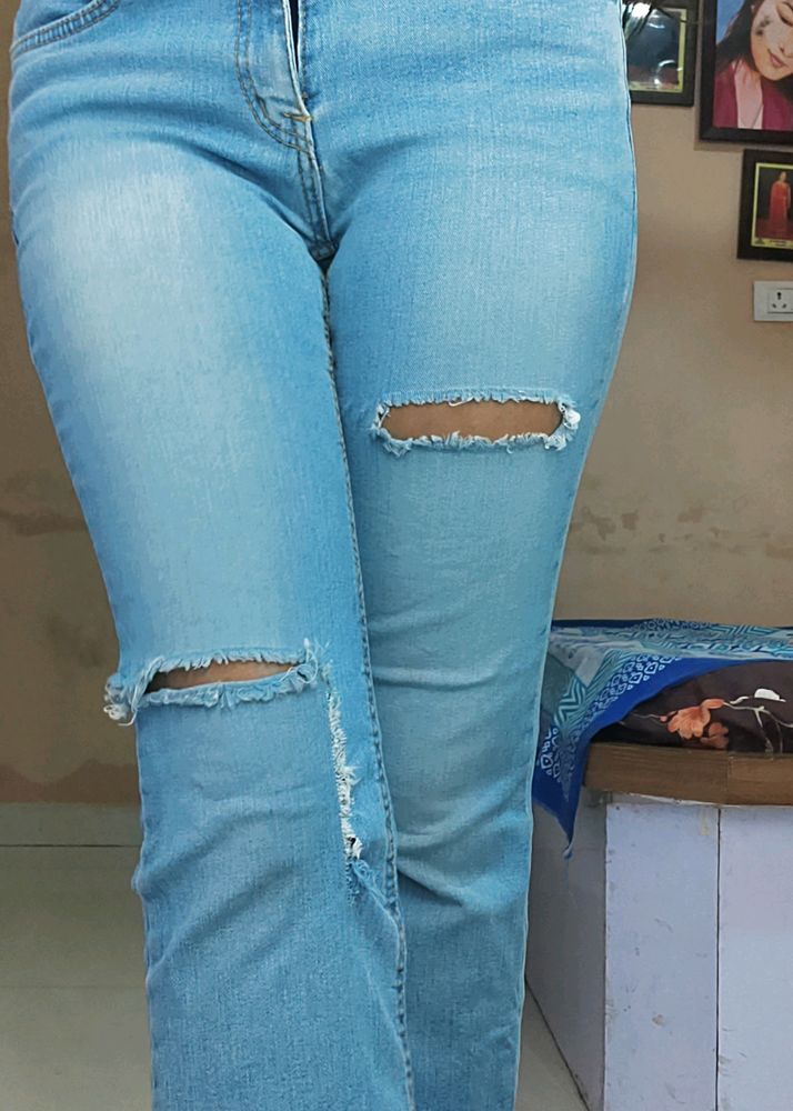 Ripped Blue Jeans