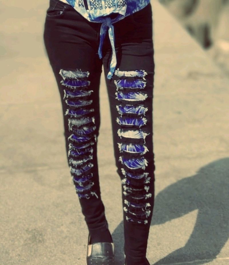 Black patterned skinny jeans